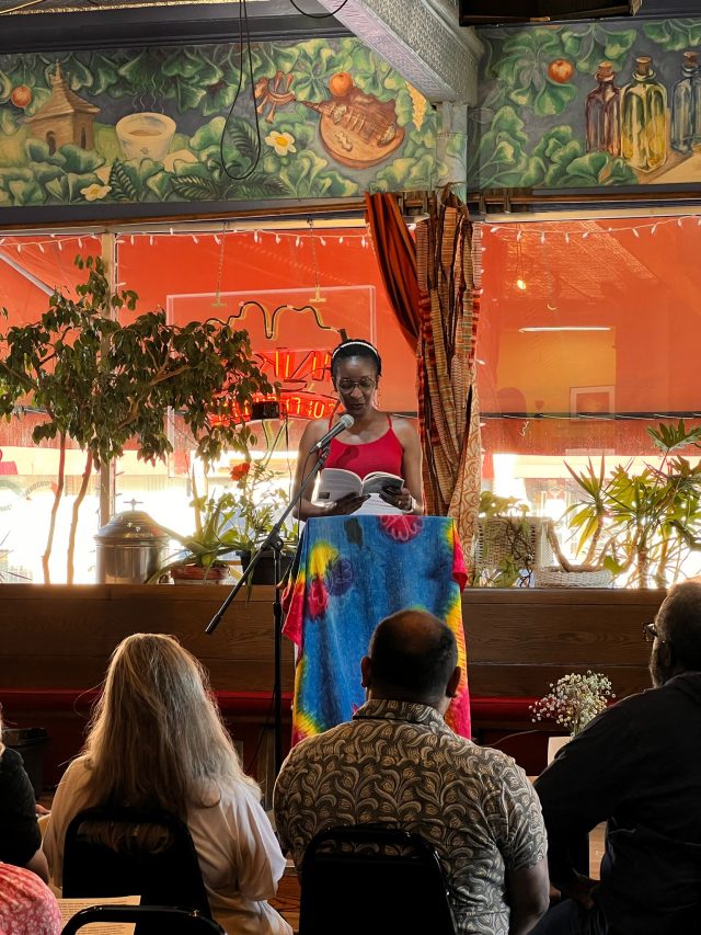 Mubanga Kalimamukwento reading at book launch in Minnesota. 